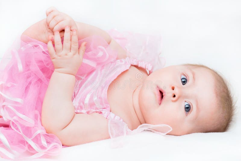 baby in pink dress