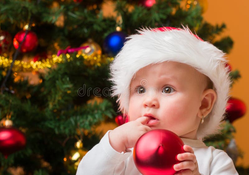 Baby girl wearing santa hat