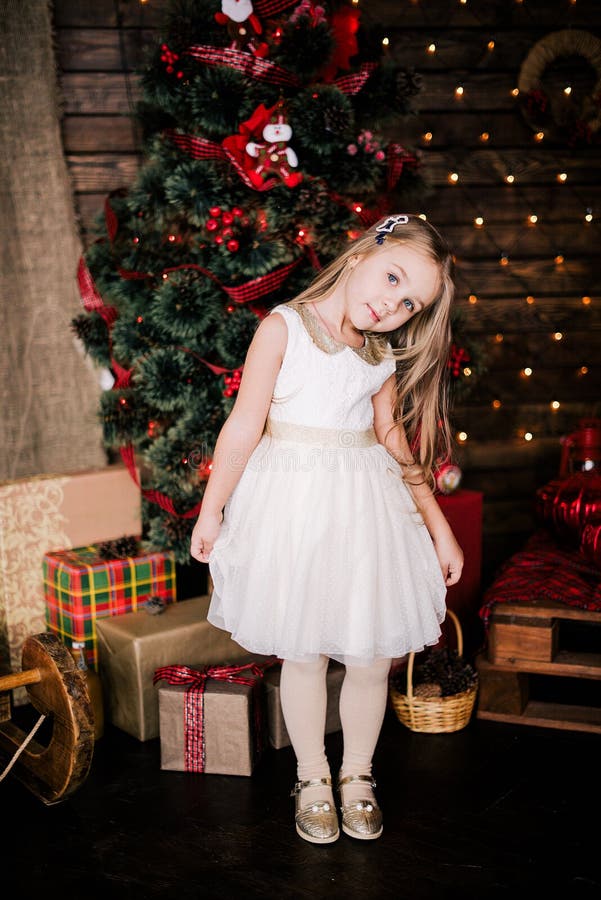 Baby Girl 4-5 Year Old Posing in Room Over Christmas Tree with ...