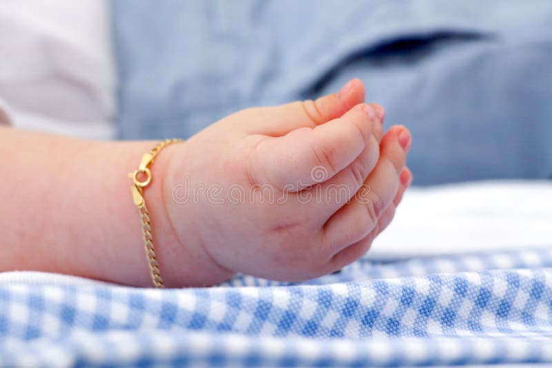190 Baby Bracelet Gold Stock Photos - Free & Royalty-Free Stock Photos from  Dreamstime