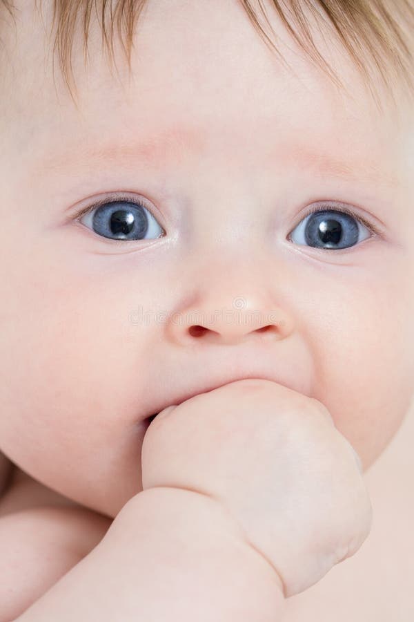 Baby with Hand in Her Mouth Closeup Stock Image Image of child, baby