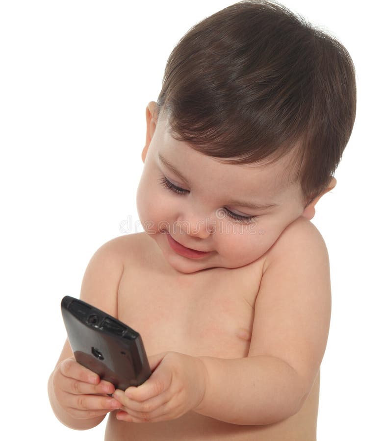 Baby happy and concentrated in a mobile phone royalty free stock photography Baby happy and concentrated in a mobile phone royalty free stock photography
