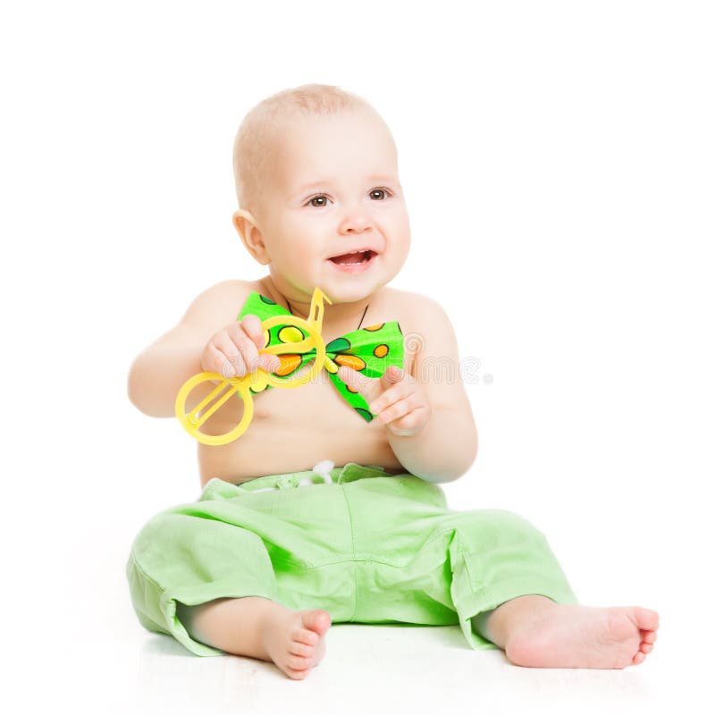 Baby happy smiling, smal kid boy in green bow tie