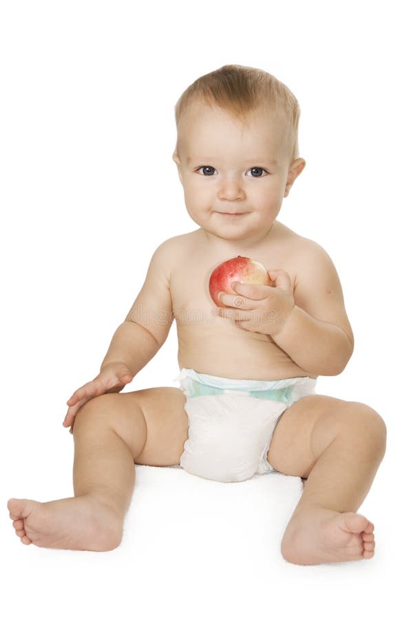 Baby holding an apple.