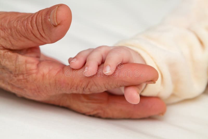 Baby Holding Great Grandmaâ€™s Finger