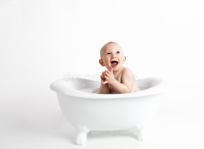 Baby Inside White Bathtub With Water Picture. Image 111545596