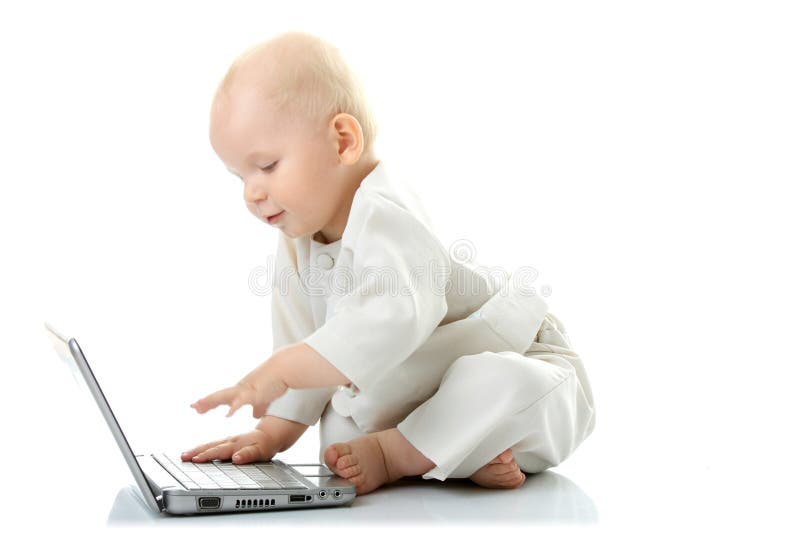 Baby with laptop stock photo