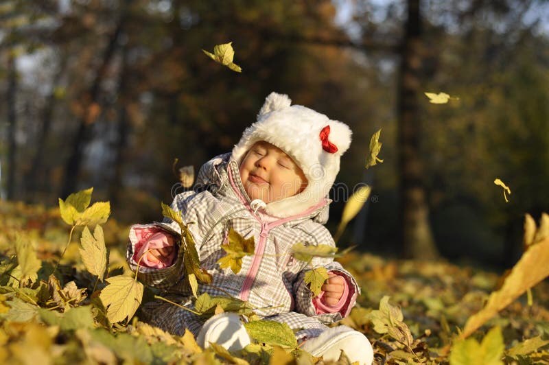 Baby with leaves