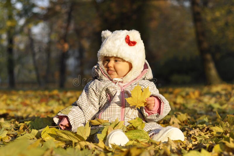 Baby with leaves