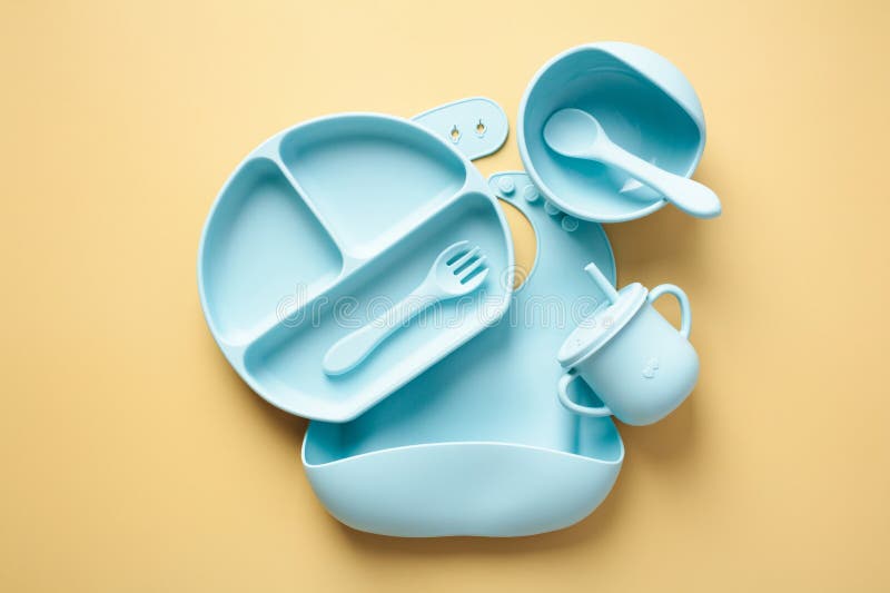 https://thumbs.dreamstime.com/b/baby-led-weaning-supplies-color-background-grade-plate-bib-sippy-bowl-cutlery-top-view-275646648.jpg