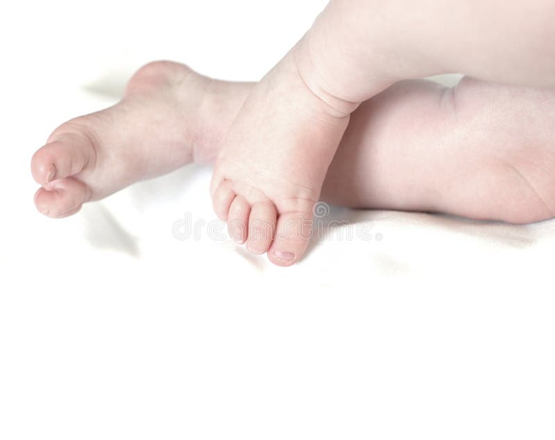 Baby Legs on White Blanket stock photo. Image of pink 6764776