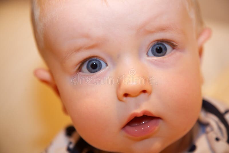 Baby looking at camera stock photo. Image of young, stare 58399082