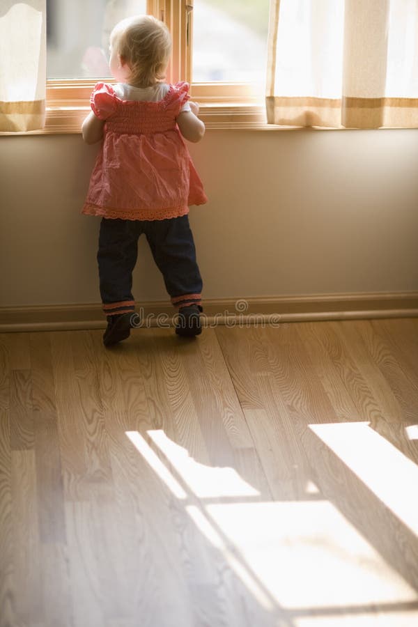 Baby looking out window stock photo. Image of child, toes 5137444