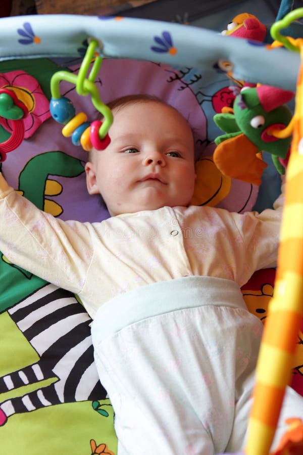 Baby is lying on stock image. Image of offspring 15213211