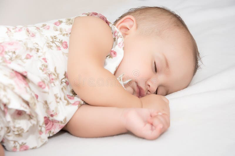 Baby Lying in Bed with a Pearl Necklace Stock Photo Image of nice