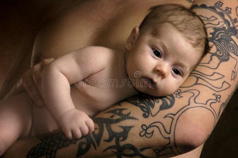 The baby on man s hands