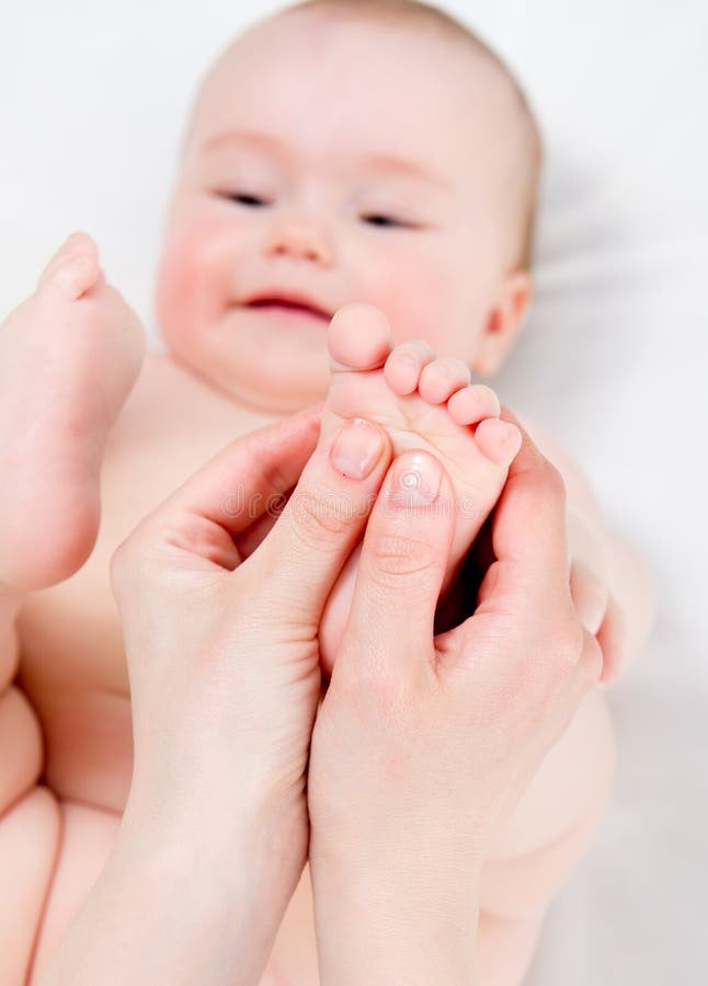 Baby massage stock photo. Image of adorable, cheerful 24535478