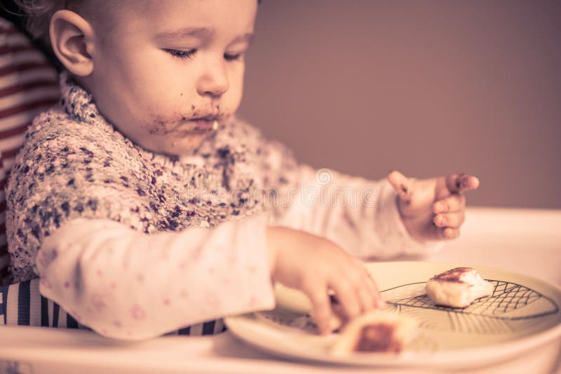 Baby Messy Face Eating Cheese Cakes Stock Photos Free & RoyaltyFree