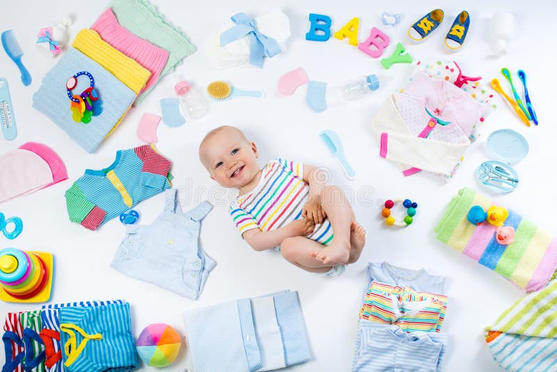Baby met kleding en zuigelingszorgpunten royalty-vrije stock afbeelding Baby met kleding en zuigelingszorgpunten royalty-vrije stock afbeelding
