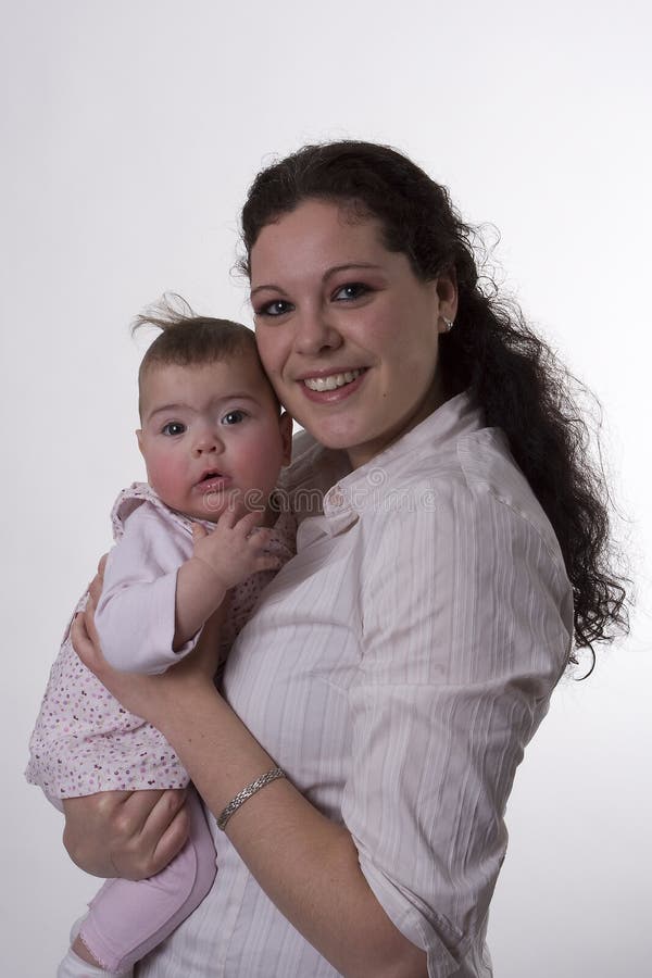 Baby and mom posing