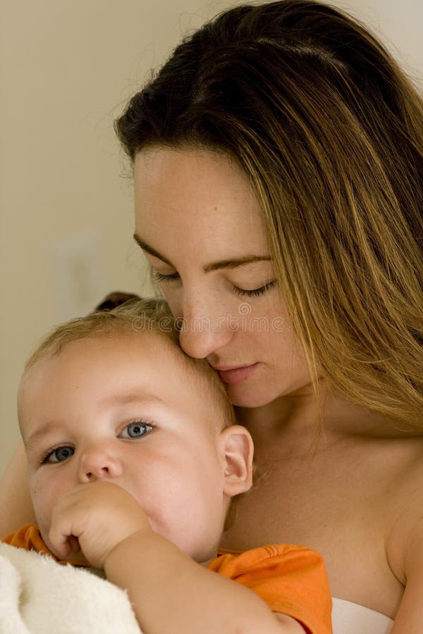 Baby and mother cuddling