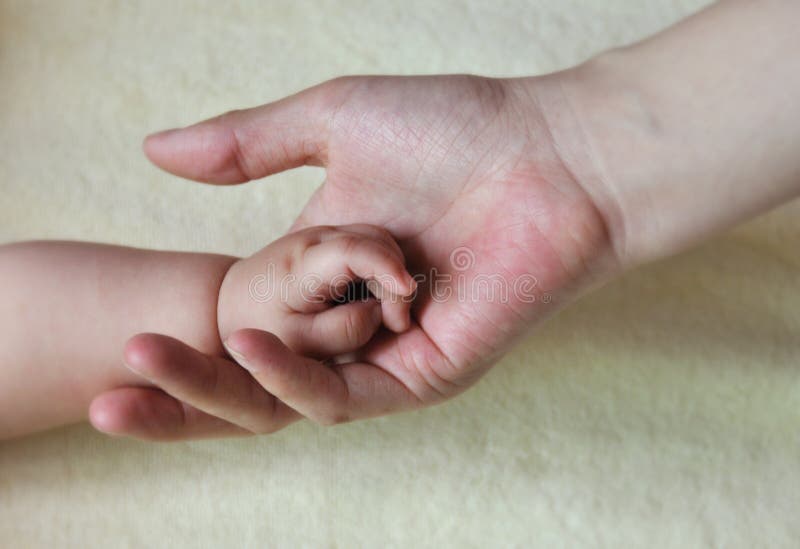 Baby and mother hands 2167