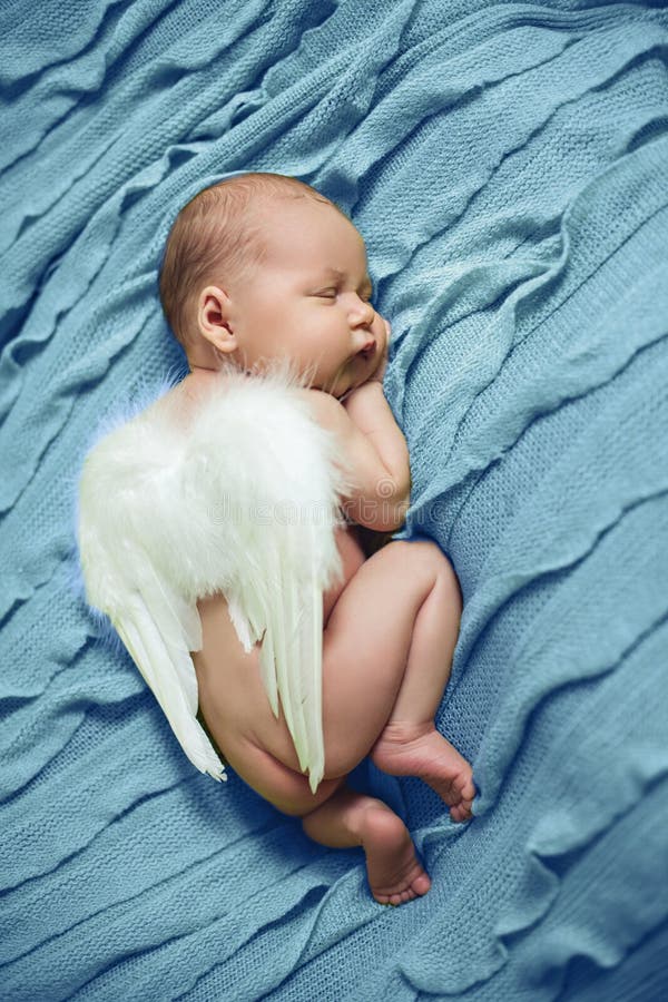 Baby Newborn With Angel Wings Sleeping