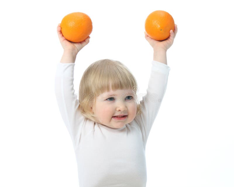 Baby with oranges stock image. Image of image, hand, juicy - 19550987