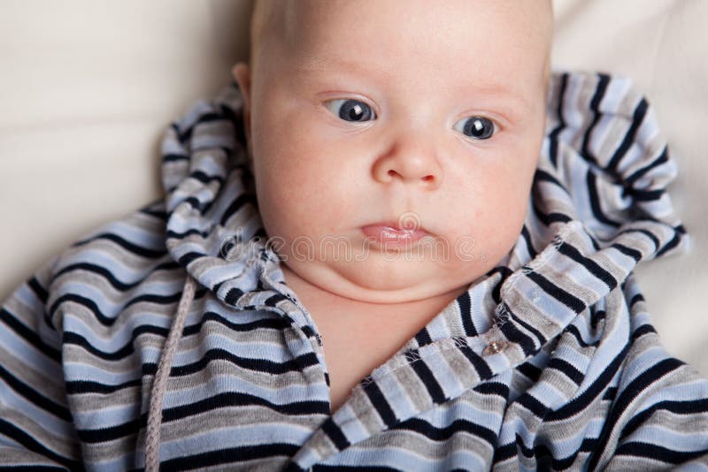 Baby In Overalls On A Plain Background Stock Image Image of camera