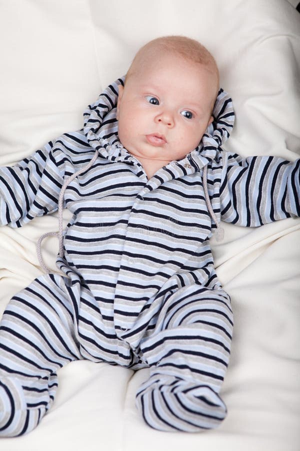 Baby in Overalls on a Plain Background Stock Image Image of jumpsuit