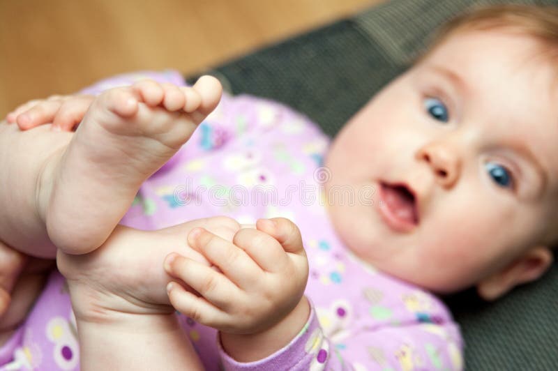 Baby play with toes