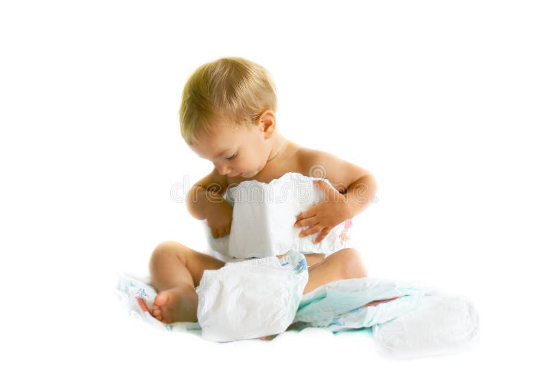 Baby playing with diapers