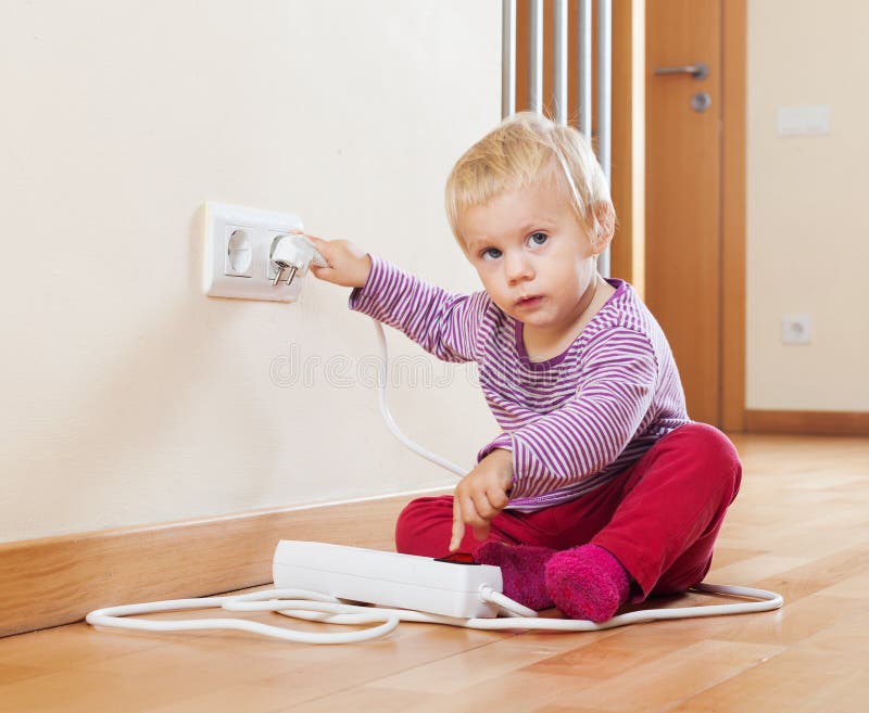 Baby Playing With Electrical Extension And Outlet Royalty Free Stock Photo Image 35985415