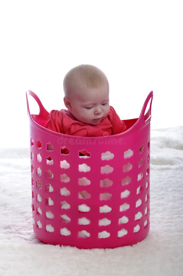 Baby Playing in Pink Plastic Laundry Basket Stock Photo Image of caucasian, eyes 22400536