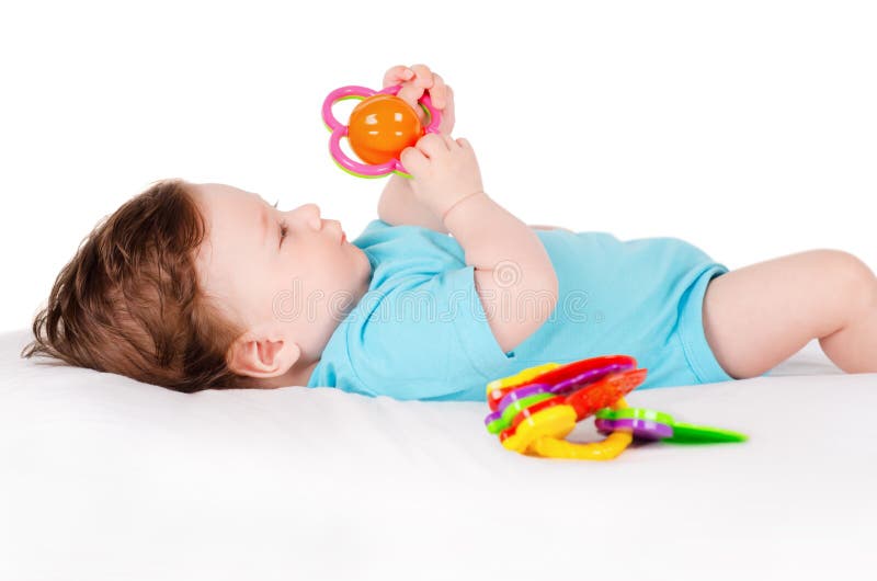 Baby playing with toy stock photo. Image of girl, months 31910474
