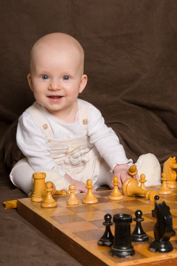 Baby plays chess