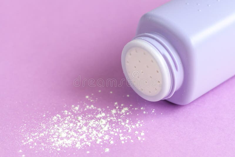 Baby powder on purple background royalty free stock images Baby powder on purple background royalty free stock images