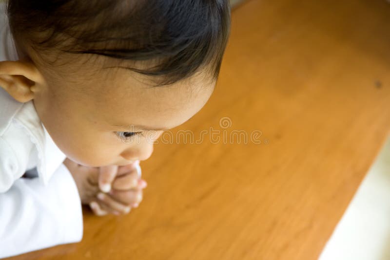 Baby praying