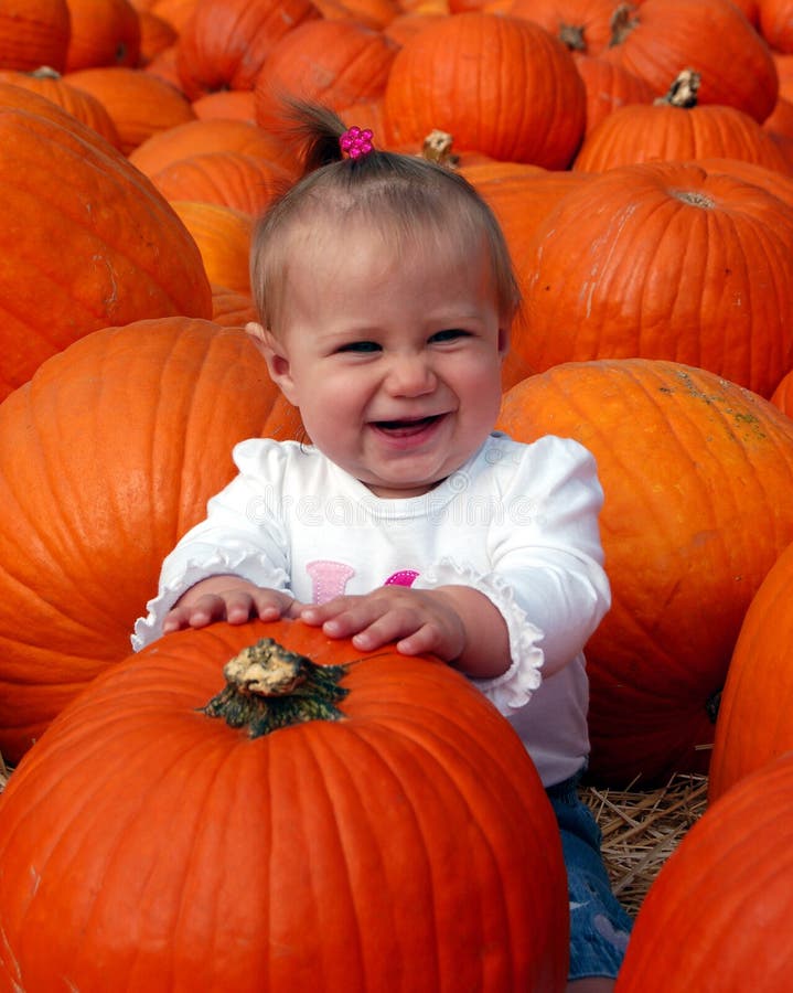 Baby in Pumpkin Patch