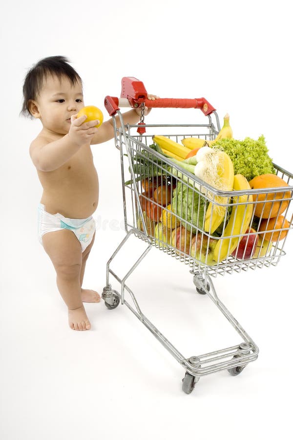 Baby pushes a shopping cart