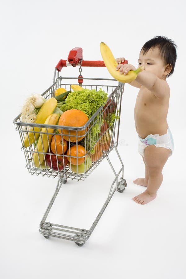 Baby pushes a shopping cart