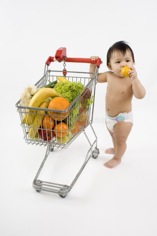 Baby pushes a shopping cart