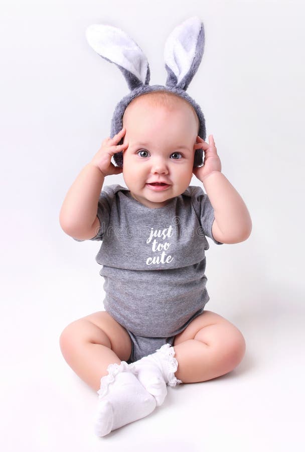 Baby in Rabbit Bunny Easter Costume on White Background. Stock Photo ...