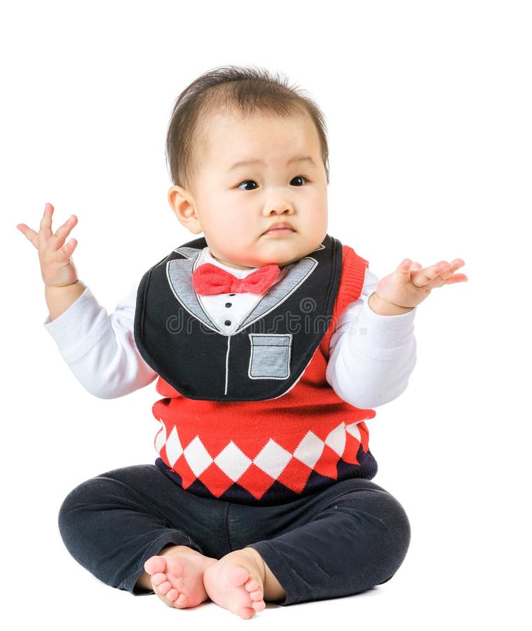 Baby Raise Up Hand and Looking at a Side Stock Photo Image of