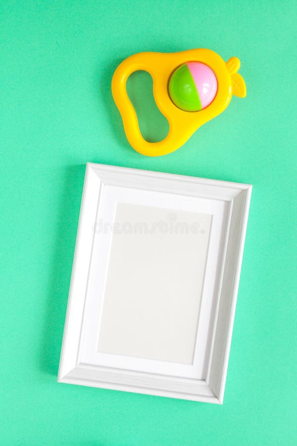 Baby Rattle Photo Frame Green Background Stock Photos Free & Royalty