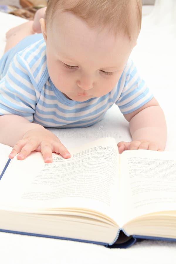 Baby reading a book stock image. Image of child, learn 31836273