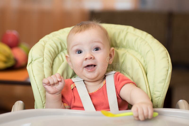 Baby Ready To Eat in the Highchair Stock Photo - Image of happy