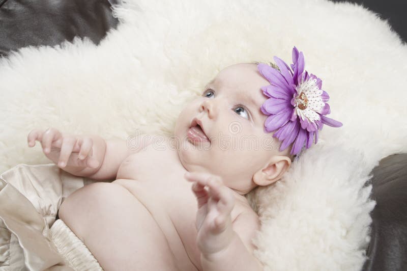 Baby on a rug stock photo. Image of stomach, skirt, sheepskin 15167662
