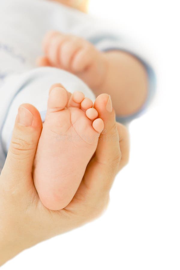 Baby s foot in parent s hand
