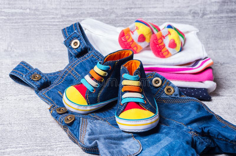 Baby clothes and shoes stock photo. Image of blue, shoes 50519220